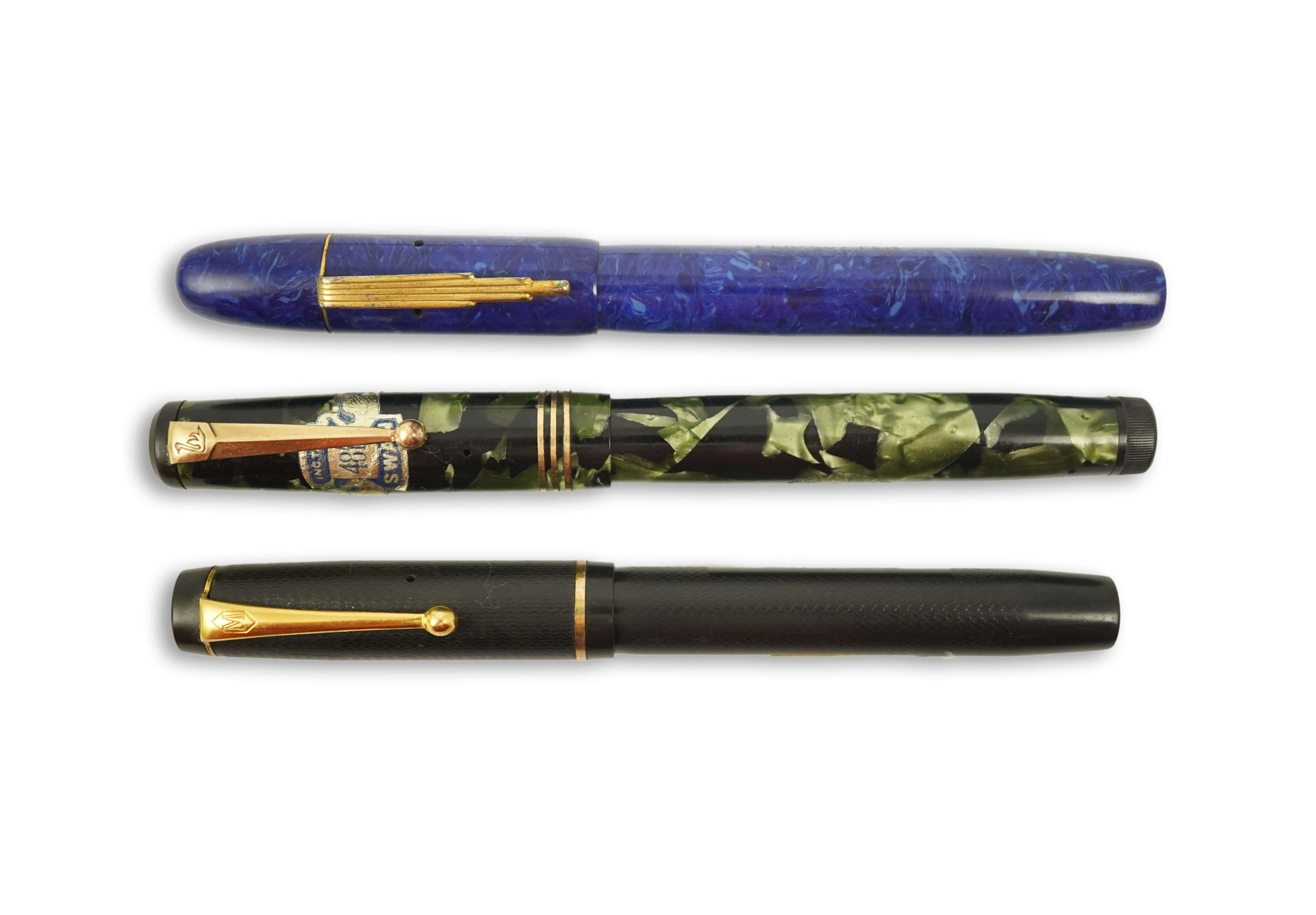 A Wyvern Perfect, No. 81, a Mentmore Autoflow fountain pen and a Mabie Todd Swan fountain pen. Condition - fair to good